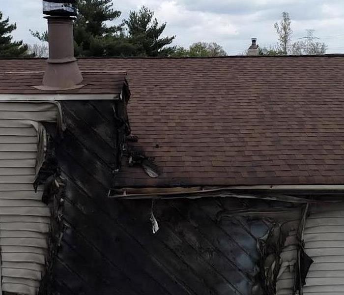 Fire damage to exterior of a home.